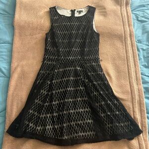 Lily Rose black lace dress over white